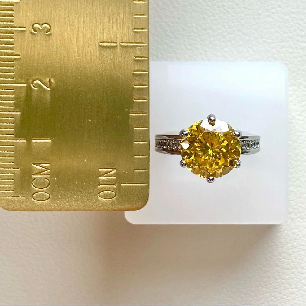 Sterling Silver Ring with Yellow Round Center Stone
